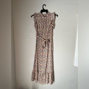 Floral maxi dress with keyhole back and waist belt.